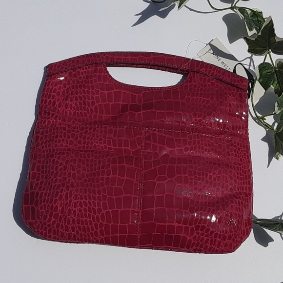 Nine West Handbags - NWT Nine West Foldable Raspberry Snakeskin Clutch